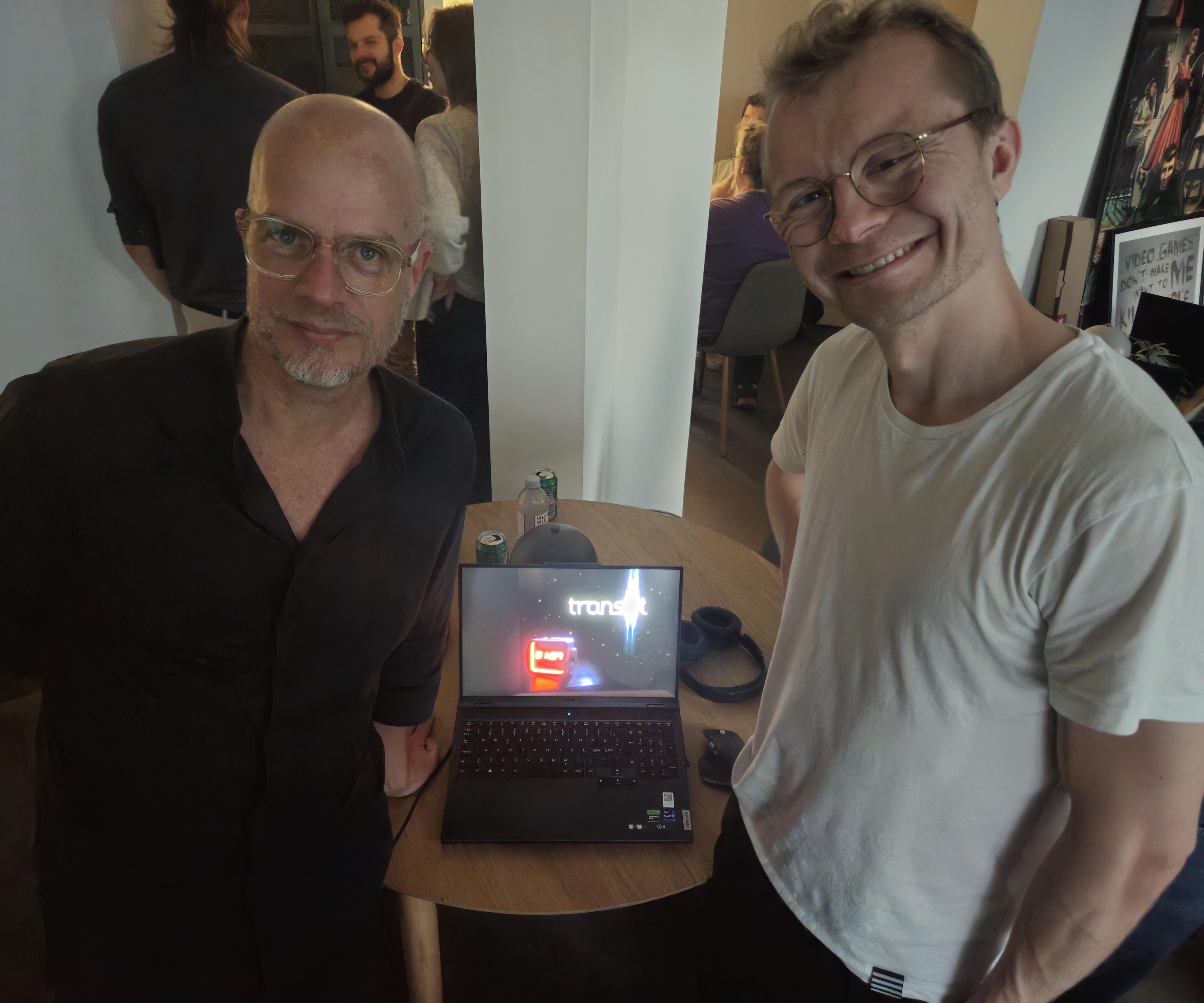 Toke Barter (Left) and Aleksander Fjellvang (Right) standing in front of a laptop with their games title screen in the back.